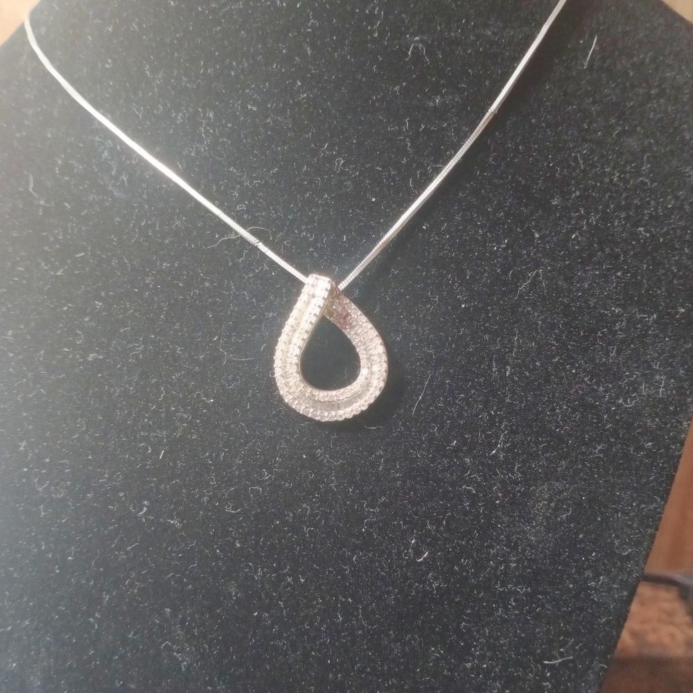KPJ white diamond teardrop, 18kt gold, sterling silver chain measures 12'